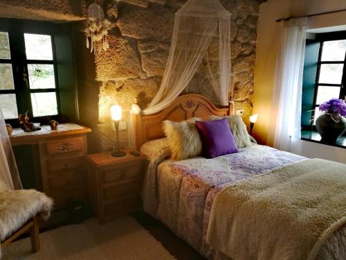Katil atau katil-katil dalam bilik di Caserio de Fontes