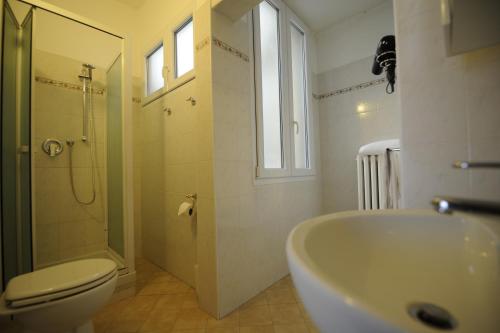 a bathroom with a sink and a toilet and a shower at B&B Calcio Storico in Florence