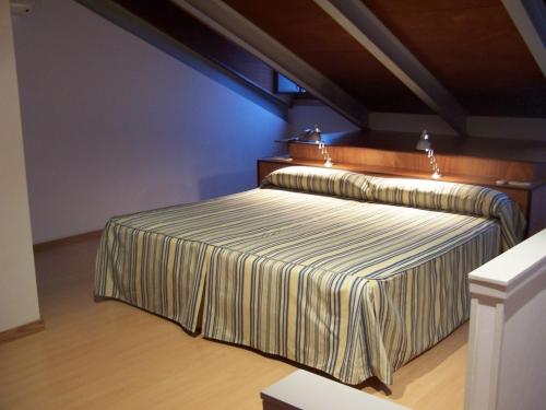 Llit o llits en una habitació de Colón Tuy