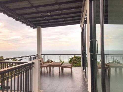 a balcony with a view of the ocean at High Life Villas in Salad Beach