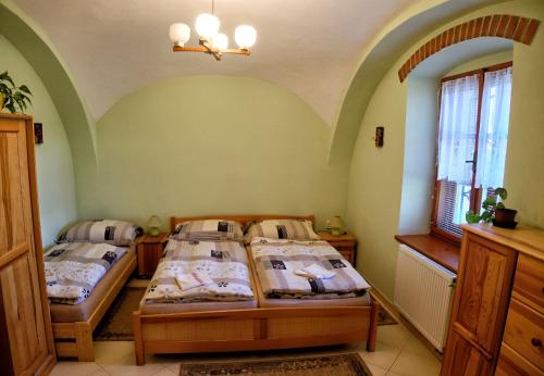 Postel nebo postele na pokoji v ubytování U Prokopů