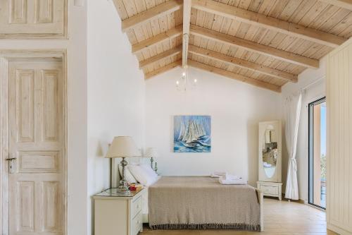 Posteľ alebo postele v izbe v ubytovaní Villa Lover's Nest
