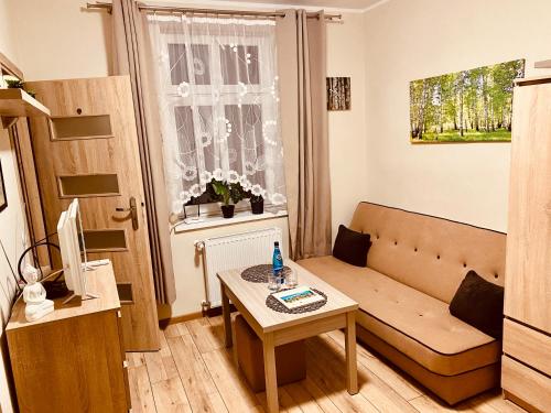 Posedenie v ubytovaní Apartamenty W Brzozowym Gaju