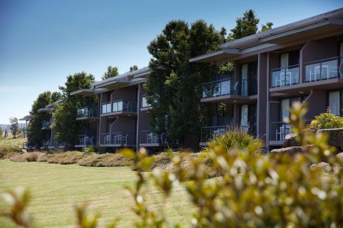 an exterior view of a building with a yard at Balgownie Estate Yarra Valley in Yarra Glen