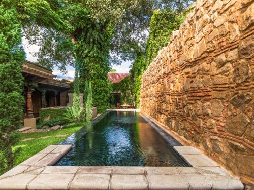
The swimming pool at or near El Convento Boutique Hotel
