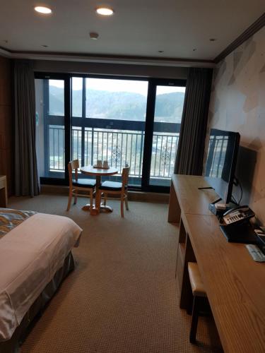 Posezení v ubytování YangYang International Airport Hotel