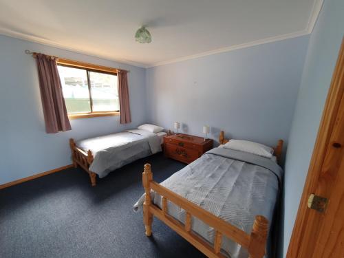 Ένα ή περισσότερα κρεβάτια σε δωμάτιο στο Lake Yalleena Nature Retreat