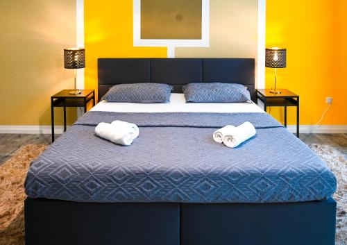 Säng eller sängar i ett rum på Highlight Suite Donaustadt
