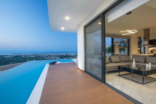 a swimming pool in the middle of a house at ioniangems in Lefkada Town