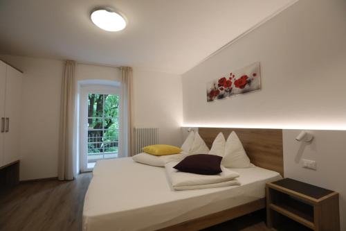 מיטה או מיטות בחדר ב-Hotel Stampfer B&B