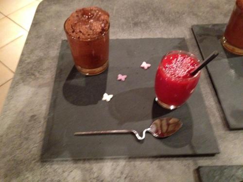 a tray with two drinks and a spoon and a drink at Chambre et Table d'hôtes Magaadjukalo in Saint-Maurice-de-Lignon