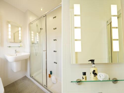 a bathroom with a shower and a sink at Copper Meadow in Launceston