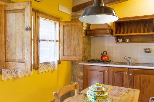 Kuchyň nebo kuchyňský kout v ubytování Fattoria Il Milione Agriturismo