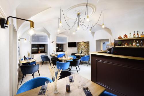 Reštaurácia alebo iné gastronomické zariadenie v ubytovaní Kalix Boutique Hotel