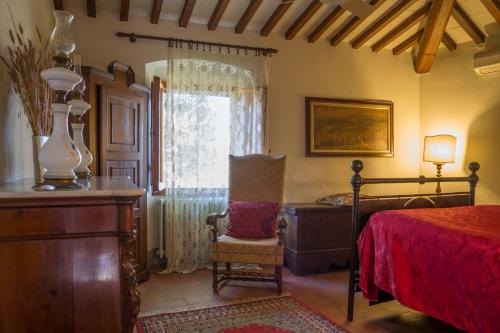 Postel nebo postele na pokoji v ubytování Fattoria Il Milione Agriturismo