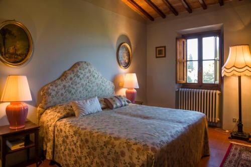 Postel nebo postele na pokoji v ubytování Fattoria Il Milione Agriturismo