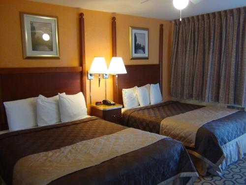 Postelja oz. postelje v sobi nastanitve Alpine Inn & Spa