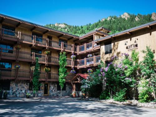 a large building with balconies on the side of it at Lift One - Mountain-side, 1 Bedroom, Stylish Remodel With View Of Aspen Mountain in Aspen