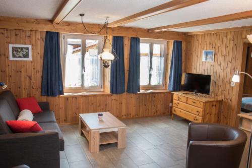 Гостиная зона в Casa Curgnun 21 Collenberg - Ferienwohnung 61m2 für max. 4 Pers.