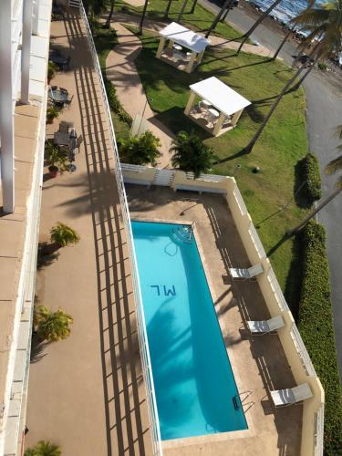 an overhead view of a swimming pool on a building at Marina Lanais Condominio in Las Croabas