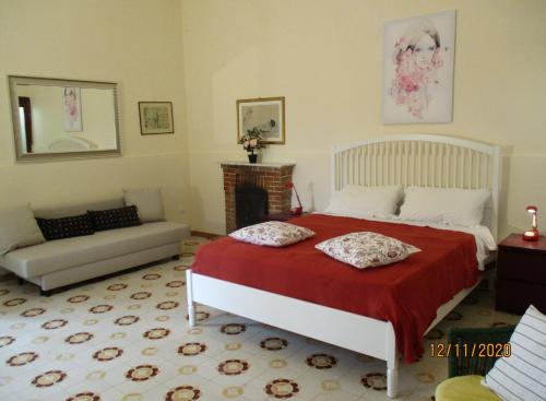 RESORT Giardino degli aranci - Casa Liscaにあるベッド