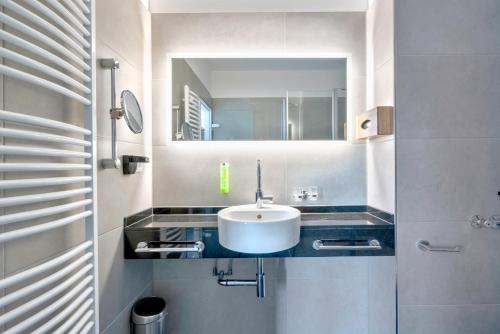 Bilik mandi di Design Hotel Wiegand
