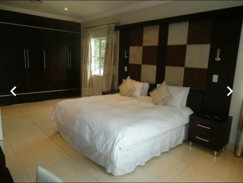 Postelja oz. postelje v sobi nastanitve Caribbean Estates: Barbados No. 12