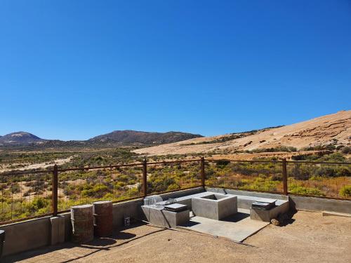 a view of the desert from a building with a view of the sky at Jakkalswater guest farm in Nababeep