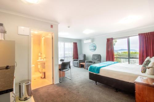Postel nebo postele na pokoji v ubytování BKs Premier Motel Esplanade