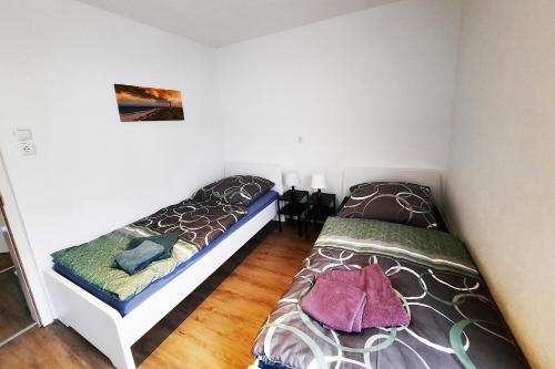 Säng eller sängar i ett rum på Workers Apartment in Oberboihingen