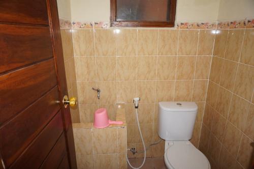 Ett badrum på QQ Guesthouse