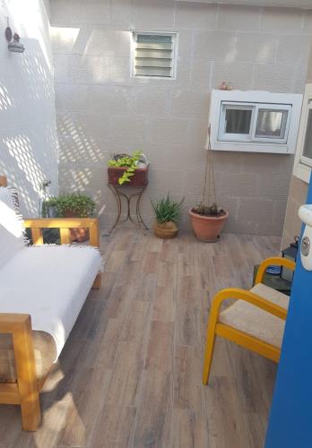כרמונ'ס פטיו - Carmona's Patioにあるキッチンまたは簡易キッチン