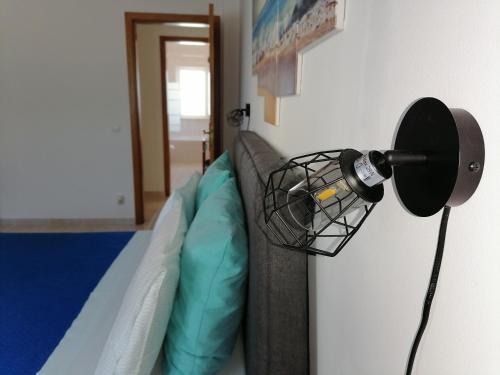 Ένα ή περισσότερα κρεβάτια σε δωμάτιο στο Azimute Guest House