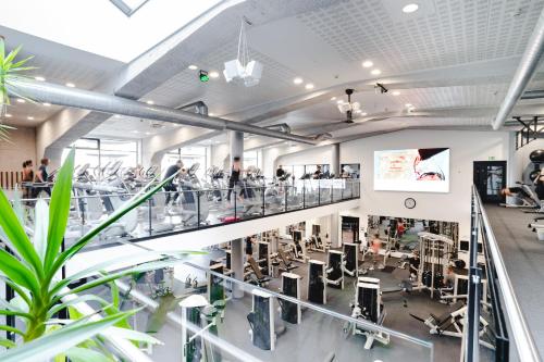 a view of the gym from the second floor of the building at Best Western ToRVEhallerne in Vejle