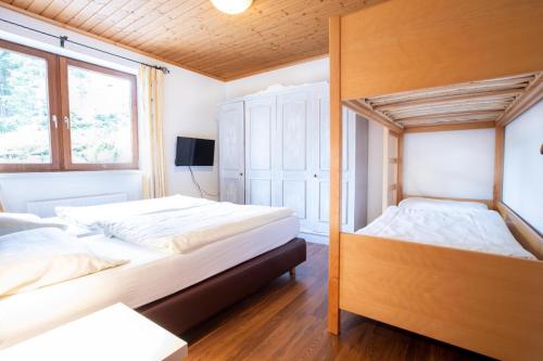 Katil atau katil-katil dalam bilik di Chalet Hochkrimml 49