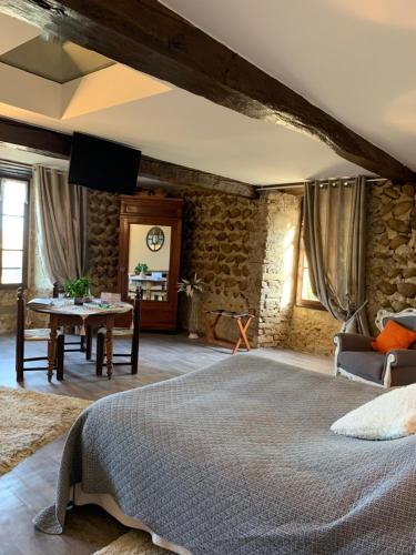 Postel nebo postele na pokoji v ubytování Chateau de la Saone