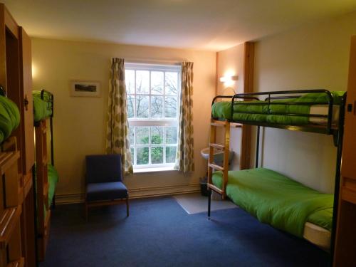 Postel nebo postele na pokoji v ubytování Ingleton Hostel