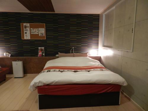 Postel nebo postele na pokoji v ubytování Mariage Hotel Adult専用