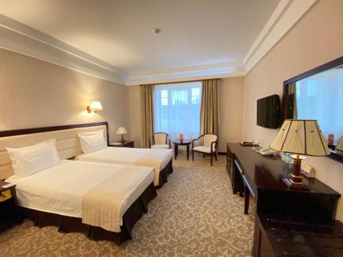 Sofievsky Posad Hotelにあるベッド