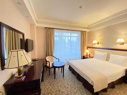 Sofievsky Posad Hotelにあるベッド
