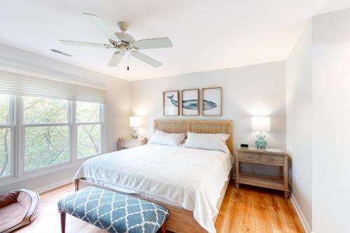 a bedroom with a bed and a ceiling fan at Sea Colony - 56059 Pinewood in Bethany Beach