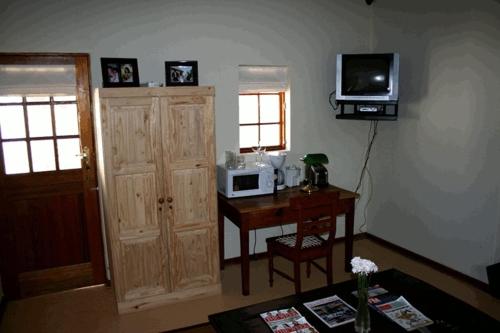 TV a/nebo společenská místnost v ubytování Steynshoop self-catering Valley Lodge