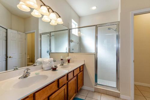 a bathroom with a sink and a shower at Gorgeous Davenport 5 Bed Villa with Pool Hot Tub in Davenport