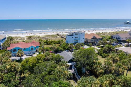 an aerial view of a beach with houses and condos at 306 E Arctic Ave. in Folly Beach