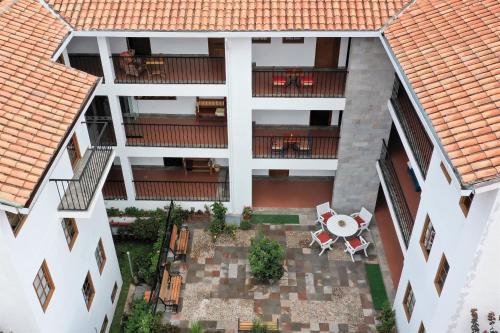 an overhead view of an apartment building with a patio at Atoq San Blas Hotel in Cusco