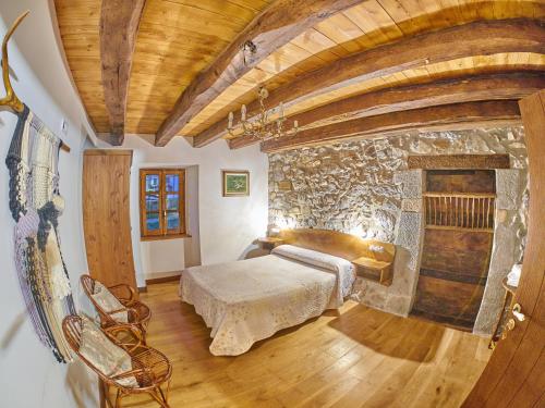 Postel nebo postele na pokoji v ubytování Casa Rural Lenco