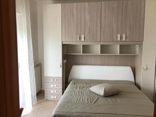 Łóżko lub łóżka w pokoju w obiekcie Luxury Affitti brevi