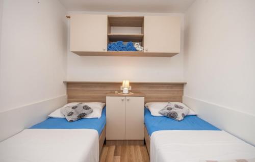 Cama o camas de una habitación en Mobile home Sea Bream