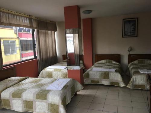 Postel nebo postele na pokoji v ubytování Hotel Diana Real