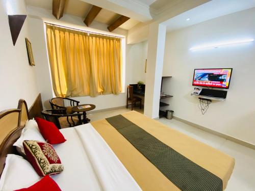 Televisyen dan/atau pusat hiburan di Hotel The Galaxy